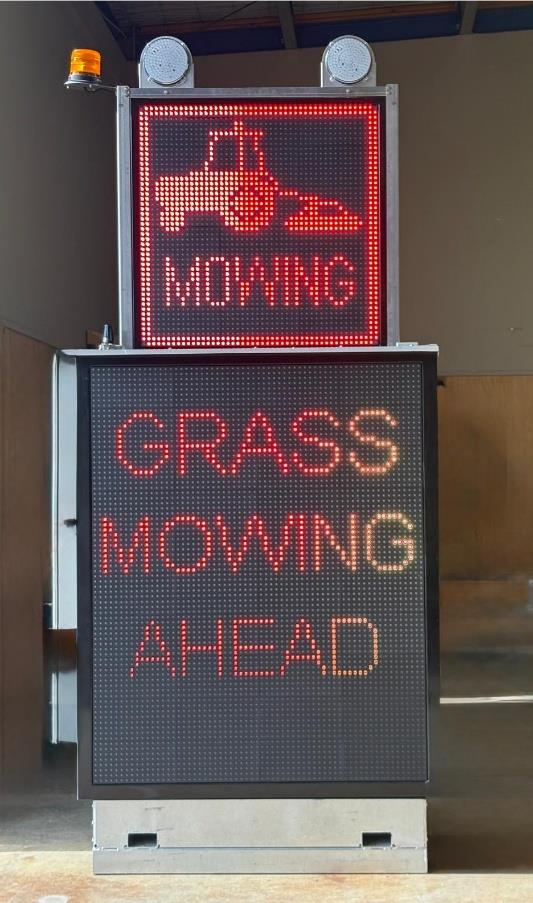 AWVMS board displaying grass mowing ahead